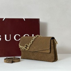 Premio Replica Borsa a tracolla Gucci media con motivo GG goffrato e catena 857622 scamosciata marrone Imitazione Outlet