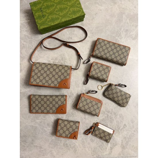 Replica Portafoglio continentale Gucci con emblema GG 821802 marrone Imitazione Outlet Online