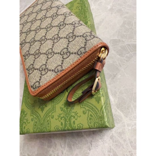Replica Portafoglio Gucci GG Supreme con cerniera 821803 Marrone Imitazione Outlet Online