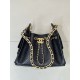 Replica di alta qualità Borsa Chanel piccola 25 AS5631 Hobo con design traforato nera Replica di lusso Borsa Chanel piccola 25 AS5631 Hobo con design traforato nera Imitazione Falso