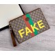 Replica Pochette con stampa 'Fake / Not' 636171