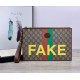 Replica Pochette con stampa 'Fake / Not' 636171