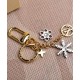 Replica LV Snowflakes Borse Charm e portachiavi M80240 d'oro