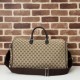 Borsa da viaggio Gucci media in tela GG Replica Gucci da uomo 802095 marrone Imitazione