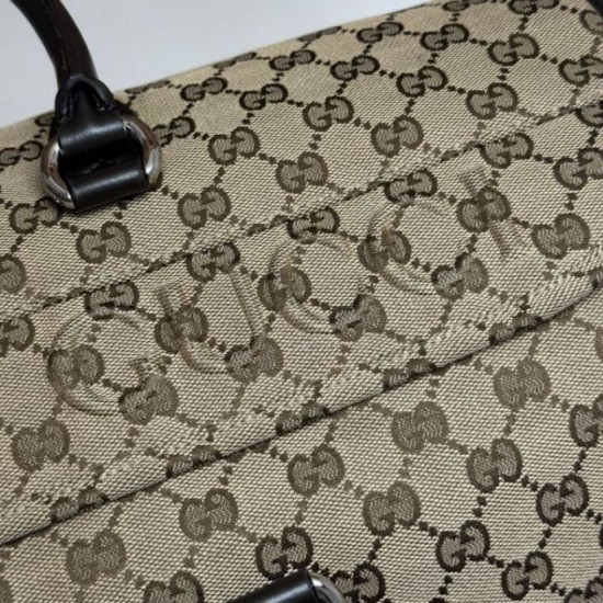 Borsa da viaggio Gucci media in tela GG Replica Gucci da uomo 802095 marrone Imitazione