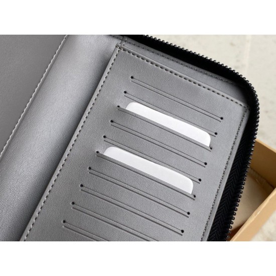 Migliore Repliche Louis Vuitton Zippy Portafoglio Vertical Monogram Shadow M81384 Economiche Outlet Online