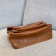 Miglior Falso Borsa Saint Laurent Niki media vitello marrone Economiche Premium