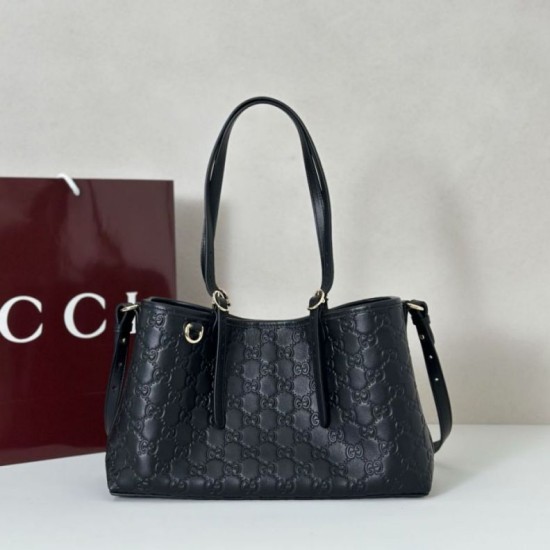 Repliche Borsa tote media Gucci 815214 GG Emblem pelle goffrata nera Imitazioni Outlet Italia