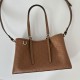 Repliche Borsa tote media Gucci 815214 GG Emblem pelle goffrata marrone Imitazioni Outlet Italia
