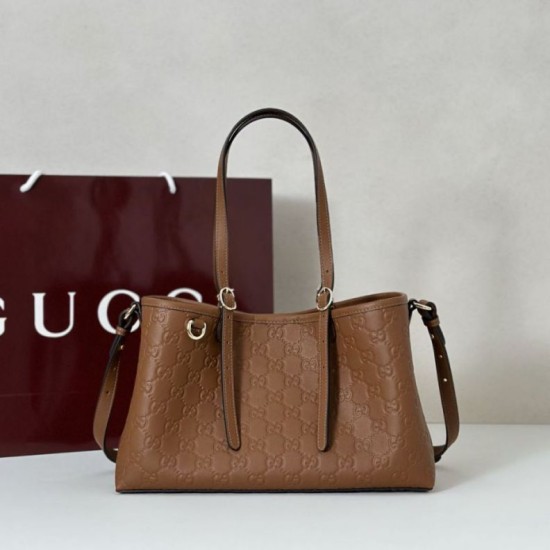 Repliche Borsa tote media Gucci 815214 GG Emblem pelle goffrata marrone Imitazioni Outlet Italia