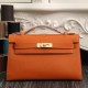Replica Borse Hermes Kelly Pochette in pelle arancione Epsom